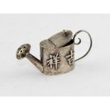A miniature Chinese export silver watering can, of traditional oval form, with hinged lid and