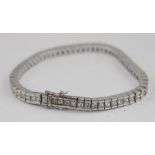 **VENDOR COLLECTED THE LOT ON 14/02/18**An 18ct. white gold and diamond bracelet, formed from a