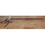 **REOFFER IN APR LONDON 120/180**An Edward VII officers ceremonial sword, the 32 inch engraved blade