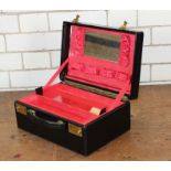 **REOFFER IN APR LONDON 60/80**A good black leather vanity case, fitted with a lift out tray and