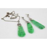 A Chinese white metal, jade and diamond pendant and en suite drop earrings, c.1930's, the pendant