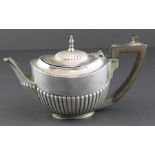 A silver batchelors' teapot, by William Hutton & Sons Ltd, assayed London 1901, of oval form with