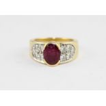 **VENDOR COLLECTED THE LOT ONO 14/02/19**A yellow metal, ruby and diamond dress ring, having wide