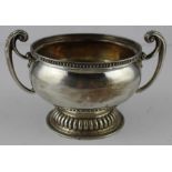 **REOFFER IN APR LONDON 80/120**A silver twin handled circular pedestal bowl, by Goldsmiths &