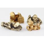 A group of four Japanese ivory netsuke, each modelled as a figure, longest 5 cm long (4)