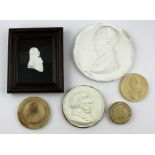 **REOFFER IN APR LONDON 30/50*8A well executed medallic bust of a young man to left, in white