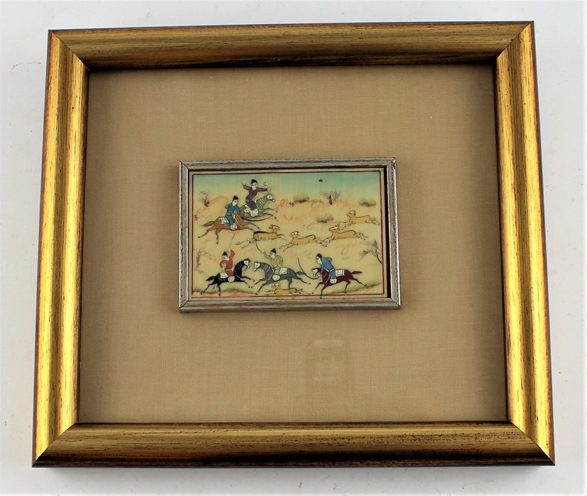 **REOFFER IN APR LONDON 30/50**An Indian (Moghul School )ivory rectangular plaque, depicting figures