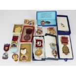 A collection of masonic medals, to include two silver gilt examples, other medals  from Spencer & Co