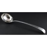 A large George III silver ladle, by Thomas Chawner, assayed London 1786, old English stem, with