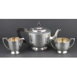 A three piece silver tea set, by Edward Barnard & Sons Ltd, assayed London 1937, comprising tea pot,