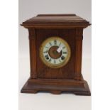 An oak mantle clock, Ansonia Works,