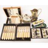 Two boxed sets of 1930s coffee bean spoons, two boxed sets of fish-eaters, teapot and hot water jug,