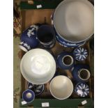 Quantity of Wedgwood dark blue jasperware to include three pedestal fruit bowls, pair of vases,