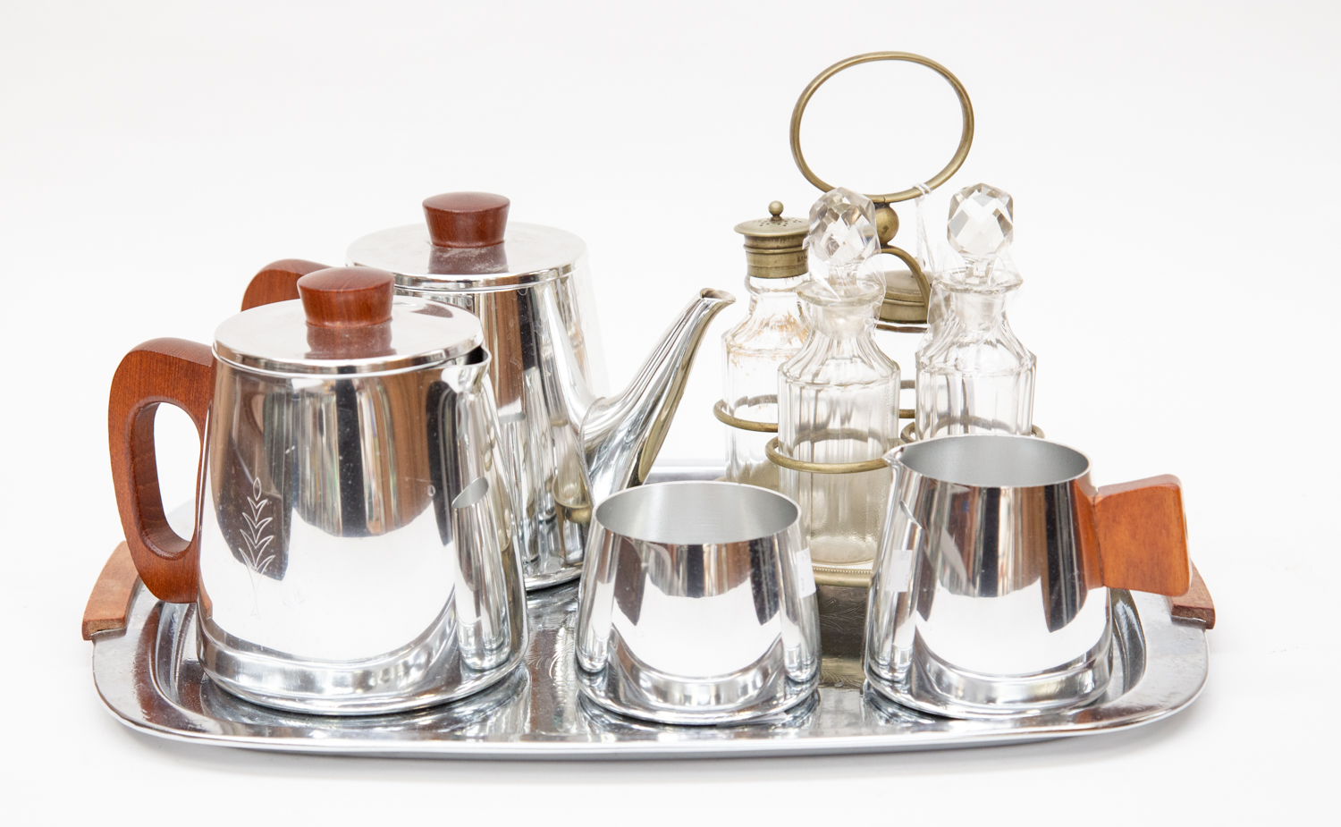 A Victorian 4 piece EPNS and cut glass cruet on stand together with a 1960's Sona five piece teaset