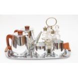 A Victorian 4 piece EPNS and cut glass cruet on stand together with a 1960's Sona five piece teaset