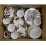 Royal Albert 'Country Roses', four cups/four saucers/four tea plates, posy,