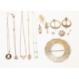 Scottish interest; silver Celtic swivel pins, a ship brooch along with similar pendant,