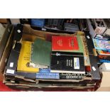 Stanley Gibbons stamp albums along with vintage manuals ie Triumph and other engine books