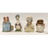 Three mid 20th Century Beatrix Potter characters and a 1970's one