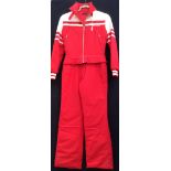 A red/white 1970's ski suit, with metal zip by D.