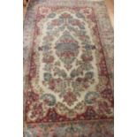 A 20th Century Agra hand knotted woollen rug,