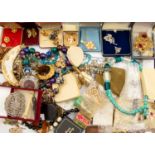 A collection of costume jewellery comprising silver clog earrings, vintage beads,