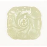 A Chinese pale jade bi, one side carved with scrolls, the reverse with birds and a flower,