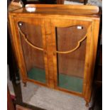 A George V walnut veneered display cabinet