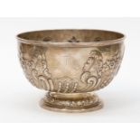 Embossed silver bowl with foliate decoration, engraved monogram, by Goldsmiths & Silversmiths Ltd,