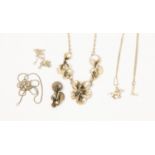 An artisan silver necklace and matching brooch with genuine pearl; together with racehorse charm,