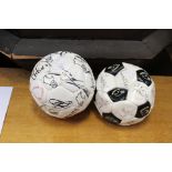 A pair of Derby County signed footballs