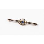 An Art Deco diamond and sapphire bar brooch, platinum top, yellow gold, total gross weight approx 3.