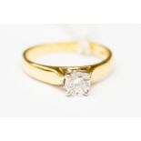 An 18ct gold and diamond solitaire, claw set, diamond weight approx 0.