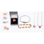 Silver and amber jewellery comprising an amber set ring, earrings,