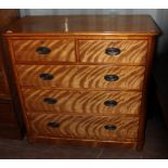 A mid Victorian satinwood chest of drawers, fitted with two short over three long graduated drawers,