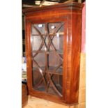 A 19th Century mahogany glazed corner cabinet,