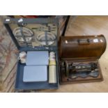 Victorian table top sewing machine along with 1950's picnic set