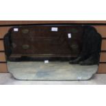 An early 20th Century bevelled edge wall mirror, 41cm high,