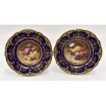 A pair of 19th Century Coalport hand painted cabinet plates, signed by "F.