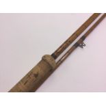 Angling interest: Hardy "No1 L.R.H Spinning" fishing rod. Complete in a green Hardy canvas cover.