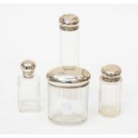 Four glass dressing table bottles with silver tops (2 a/f) Mappin and Webb, London,