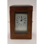 19th Century carriage clock in lizard skin carrying case,