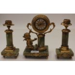 An Onyx garniture clock set,