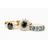 Three 9ct gold stone set dress ring,