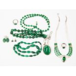 A collection of malacite jewellery including beads, silver and malacite necklace, pendant,