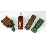 A collection of four unboxed Dinky vehicles: 250, Motocart, Luxury Coach and Castrol Petrol Wagon.