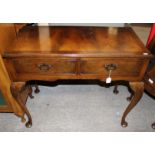 A 20th Century Georgian style mahogany side table, fitted with a two drawers,
