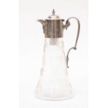 A Victorian silver mounted glass claret jug,