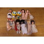 Collection of ten dolls including clockwork dancing doll, Little Red Riding Hood, Amanda Jane,