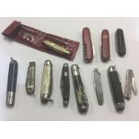A collection of 12 Penknives to include two Swiss Army style knives.